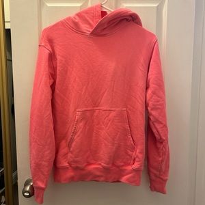 aritzia tna pink hoodie. size xxs.